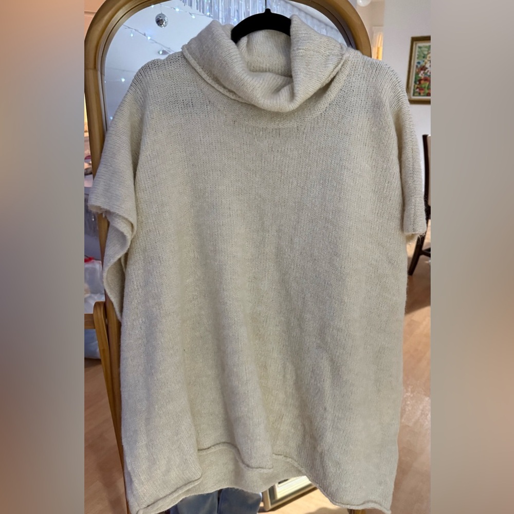 Cream turtleneck sweater